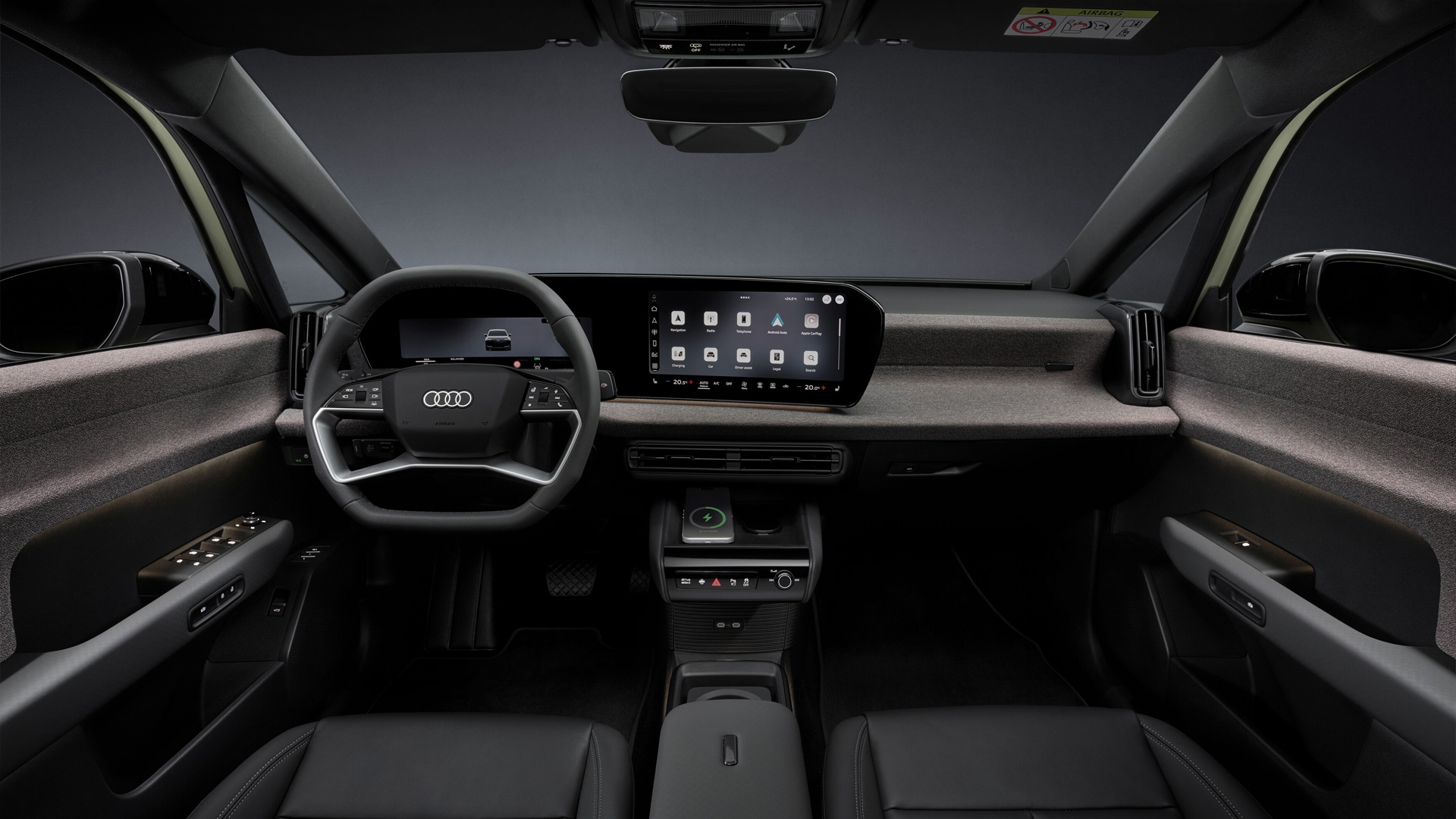 Interieur, Softwrap, Multifunktionslenkrad, MMI-Panoramadisplay, Touchdisplay im Curved Design, stoffbezogene Oberfläche Softwrap, Mittelarmlehne mit modularem Fidlock-Befestigungssystem und Telefonablage mit induktiver Ladefunktion
